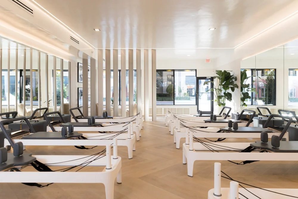 Reformer room with chevron floors and slatted columns